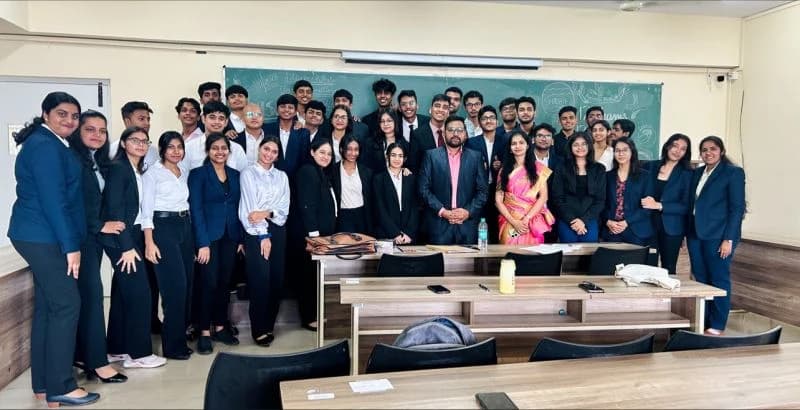 Siddu Mathapati with student participants and faculty after judging startup ideas at the Avishkar event at Jain University