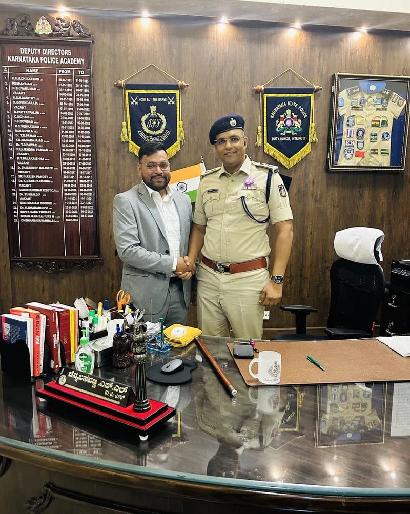 Siddu Mathapati meeting Director Channabasava IPS at the Karnataka Police Academy in Mysuru