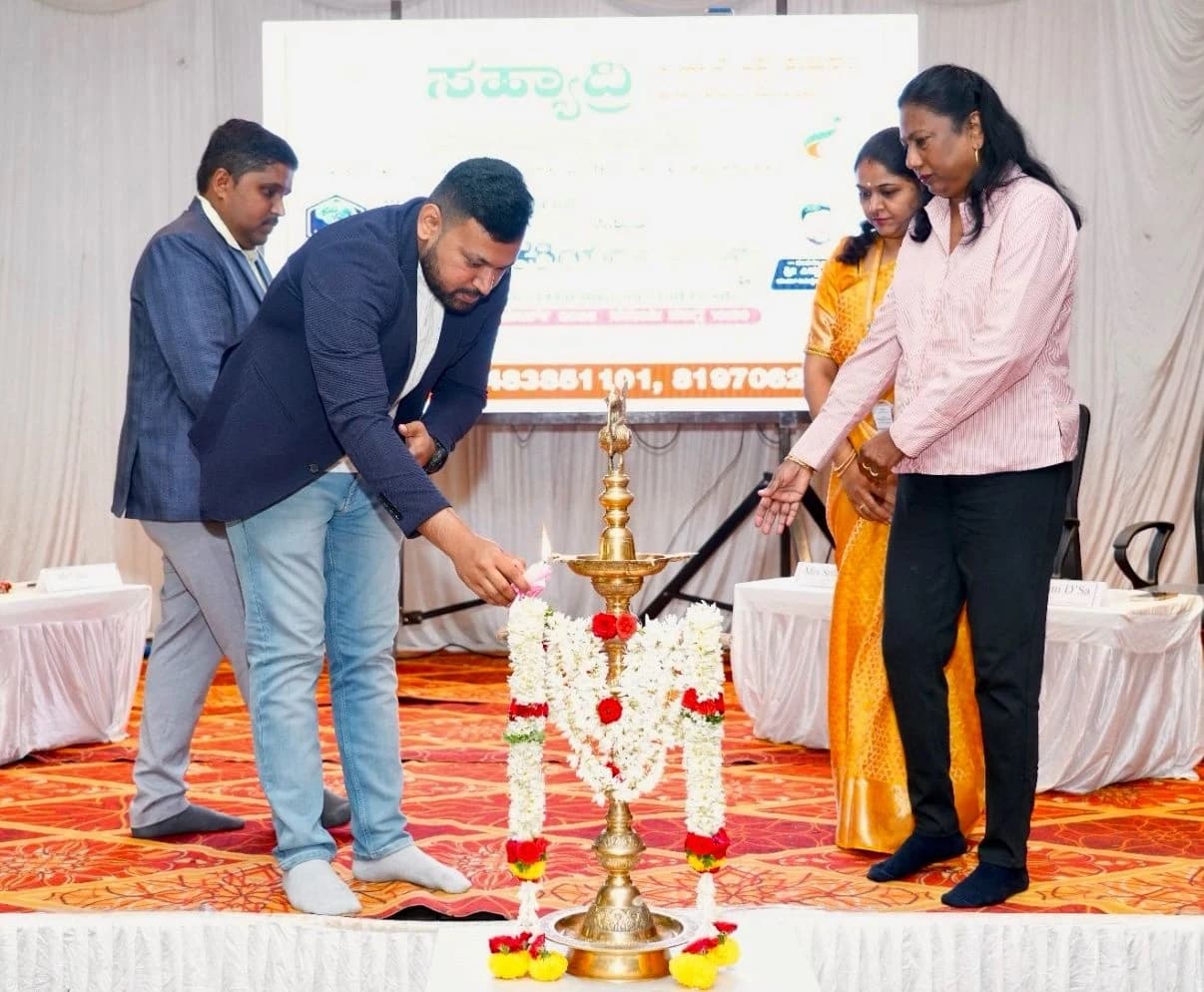 Siddu Mathapati lighting the ceremonial lamp at Sahyadri Career Connect in Chikkamagaluru.